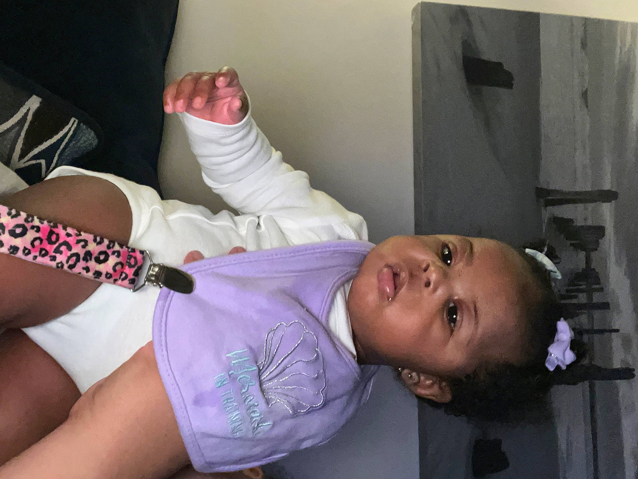 Sa Niyah is registered to the contest to win money with this photo: abdomen, bed, black_hair, chest, child, comfort, elbow, glasses, hat, human_leg, joint, knee, linens, mouth, neck, person, room, shoulder, skin, thigh