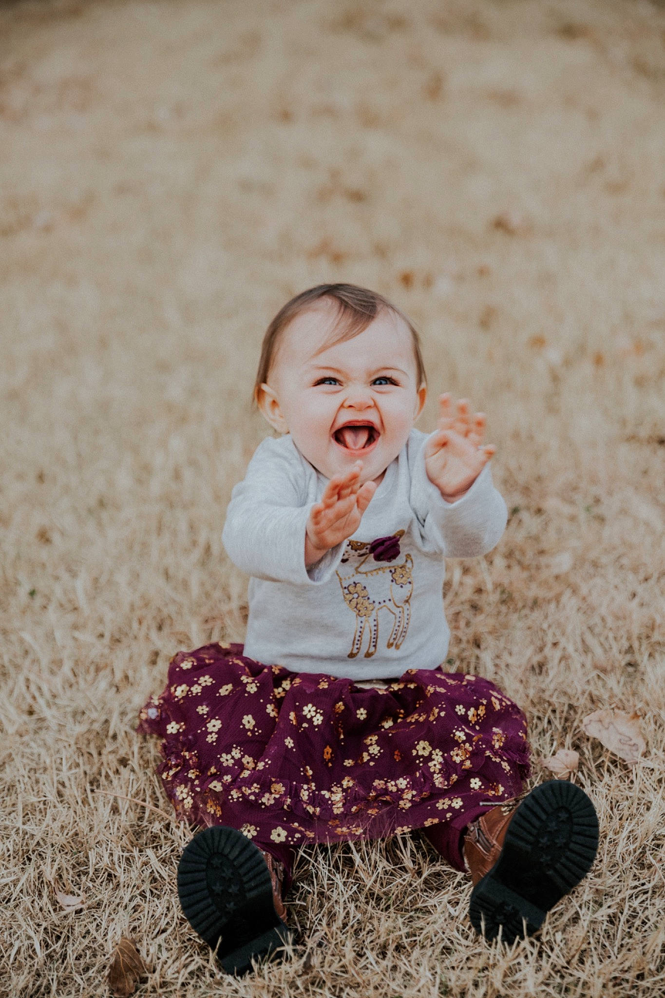 Adalynn is registered to the contest to win money with this photo: baby, baby_toddler_clothing, child, facial_expression, flash_photography, fun, grass, happy, laugh, leaf, leisure, pattern, people_in_nature, person, play, playing_with_kids, portrait_photography, sitting, smile, stock_photography