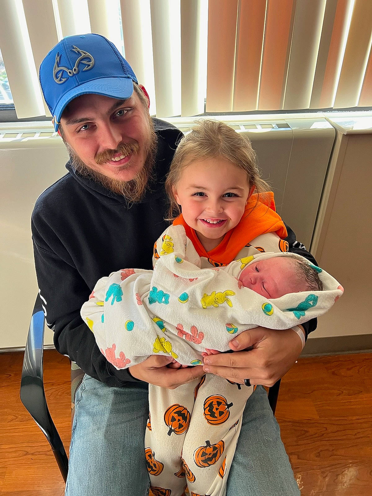 Adalynn joined the competition — help win amazing prizes! arm, baby, baby_toddler_clothing, baseball_cap, beard, cap, child, comfort, event, face, facial_expression, fun, hairstyle, happy, hat, headwear, joy, lap, mouth, person