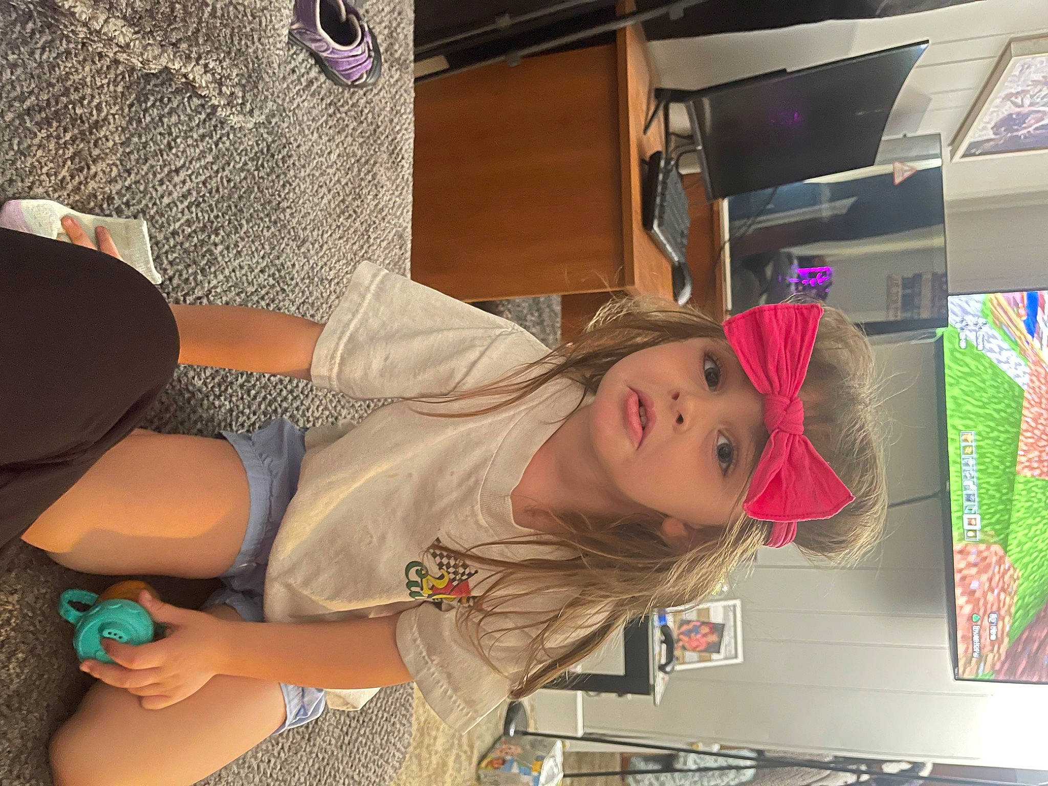 Adalynn joined the competition — help win amazing prizes! child, comfort, elbow, eyewear, fun, hat, headgear, headwear, human_leg, knee, lap, leisure, mouth, person, room, sitting, t_shirt, thigh, trunk, vacation