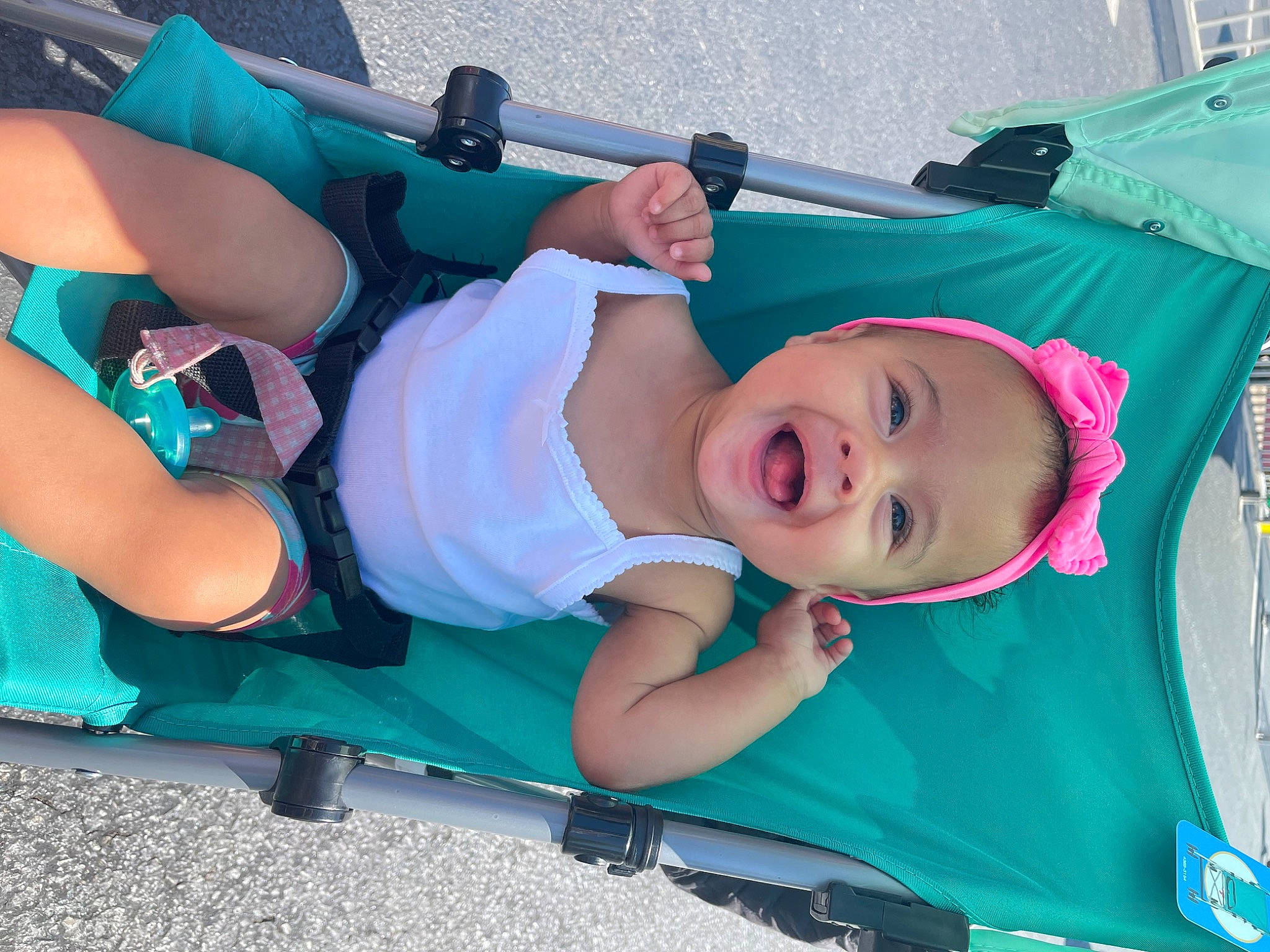 Azariah joined the competition — help win amazing prizes! automotive_exterior, azure, baby_products, baby_toddler_clothing, bumper, child, electric_blue, fun, green, hat, leisure, person, recreation, shorts, smile, summer, t_shirt, thigh, toddler, vacation