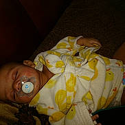 Todd is registered to the contest to win money with this photo: baby, bedtime, birth, cheek, child, mouth, nap, skin, sleep, toddler, yellow