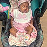 Icelynn is registered to the contest to win money with this photo: baby, infant, sleeping, car_seat, pink_clothing, headband, bow, socks, blanket, pacifier_clip, child, indoors, cute, peaceful, soft_lighting, toddler, person, resting, baby_girl, car_seat_padding