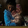 Heidi Lynn joined the competition — help win amazing prizes! woman, baby, mirror, selfie, sleeping, pajamas, blue_hoodie, indoor, wood_paneling, phone, hand, bedroom, reflection, casual, hair_bun, face, person, holding, cozy, intimate
