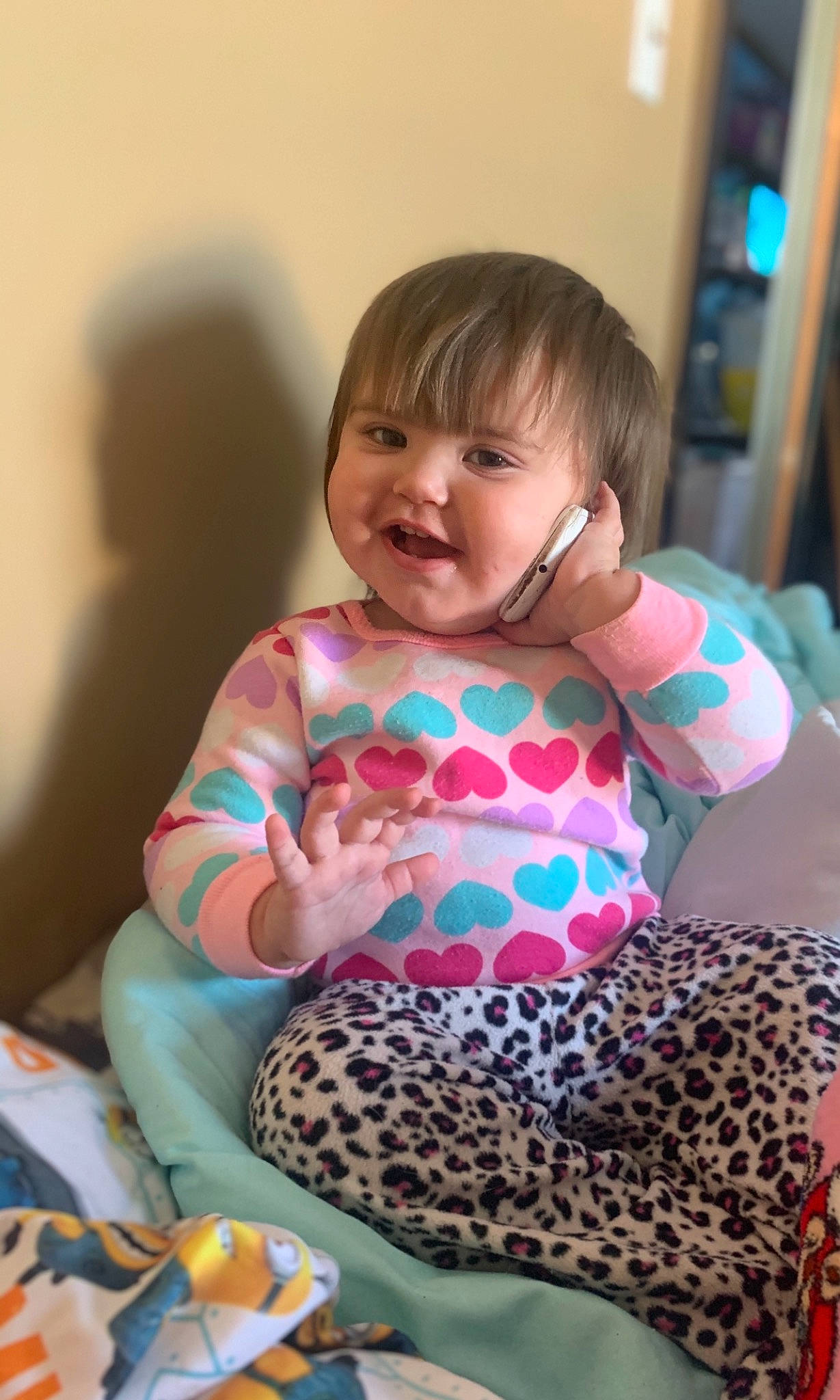 Isabella joined the competition — help win amazing prizes! arm, baby_toddler_clothing, blond, child, comfort, face, fawn, fun, happy, human_body, leisure, linens, pattern, person, recreation, skin, smile, tableware, thigh, toddler