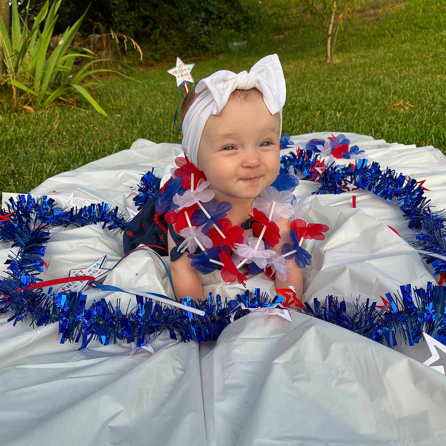 Adalynne joined the competition — help win amazing prizes! accessories, baby, candle, clothing, costume, dress, face, flower, flowerarrangement, flowerbouquet, grass, hat, head, ornament, person, petal, photography, plant, portrait, vegetation