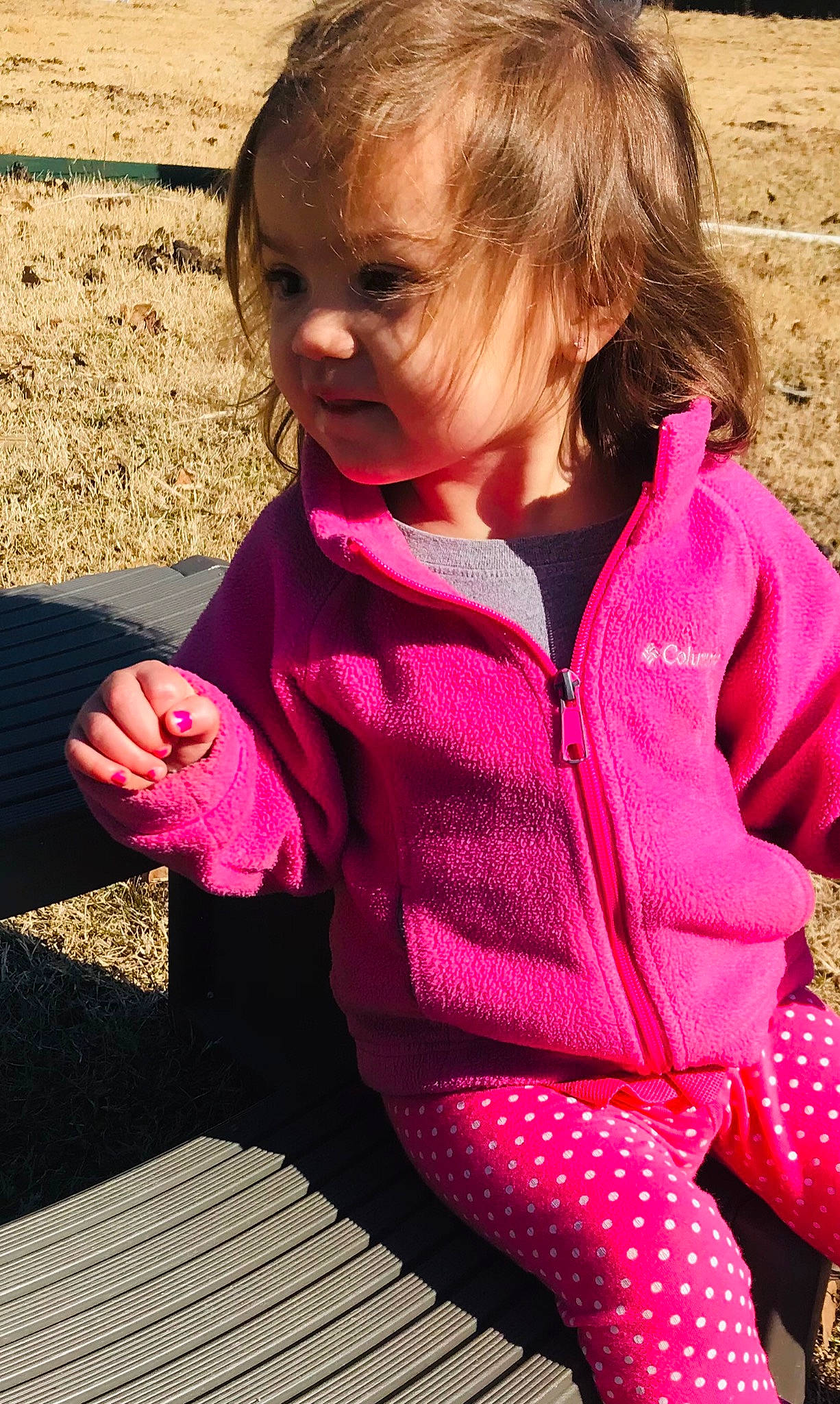Emmalee is registered to the contest to win money with this photo: baby_toddler_clothing, eye, face, hair, hairstyle, happy, head, iris, joint, leg, lip, neck, outerwear, people_in_nature, person, pink, shoulder, skin, sleeve, smile