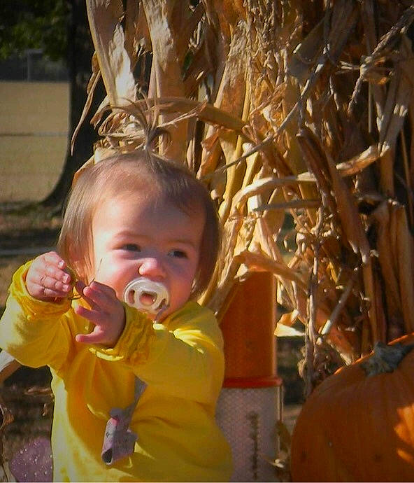 Olivia joined the competition — help win amazing prizes! baby, baby_toddler_clothing, child, fun, grass, happy, holiday, laugh, leisure, light_fixture, people_in_nature, person, recreation, sitting, smile, toddler, tree, wood