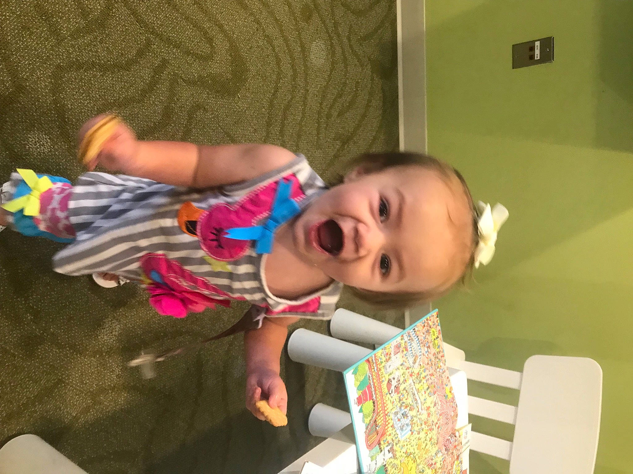 Olivia is registered to the contest to win money with this photo: baby, baby_products, baby_toddler_clothing, baby_toys, cheek, child, finger, flooring, fun, happy, head, pattern, person, play, room, sitting, smile, thumb, toddler, wood