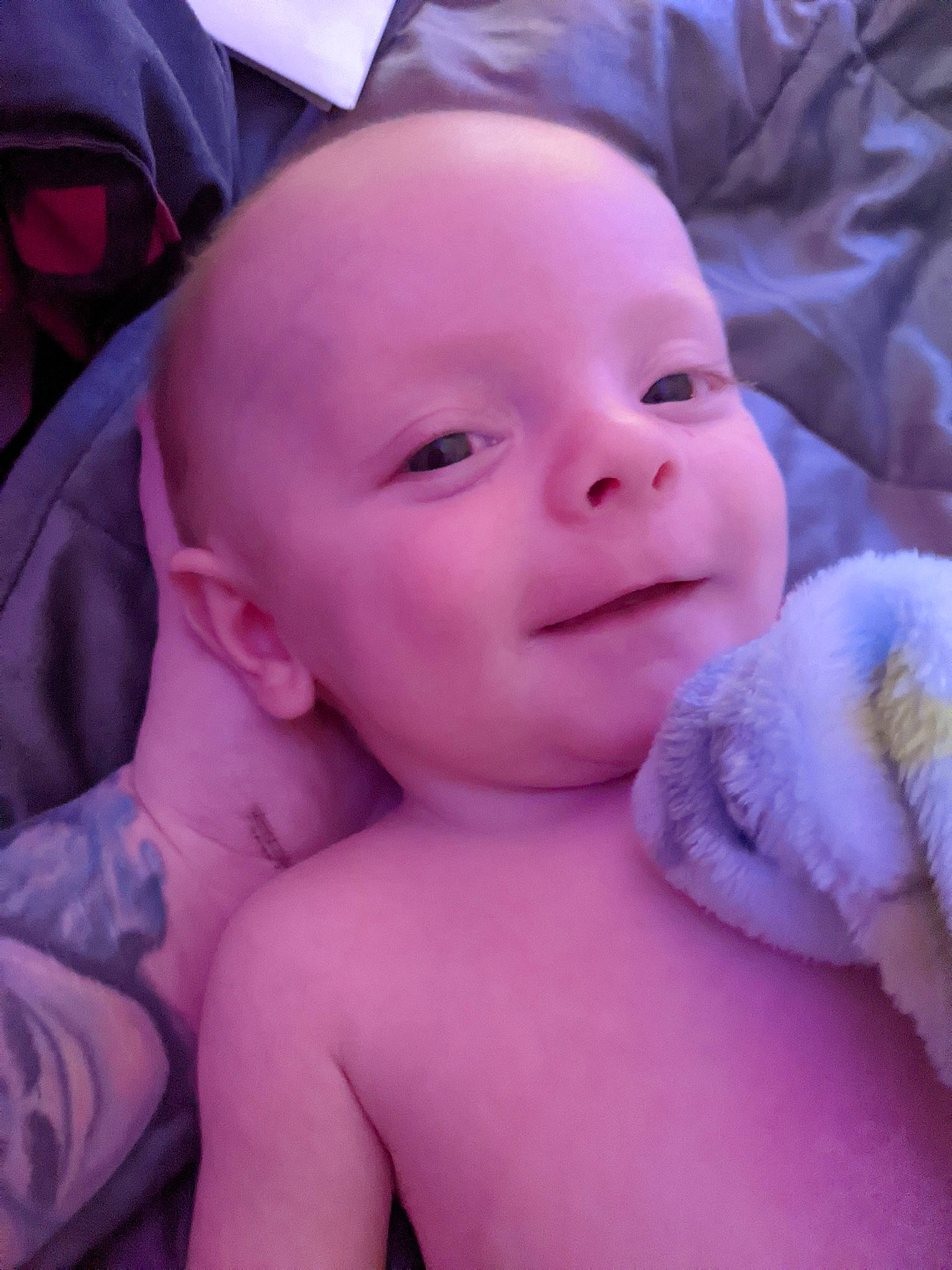 Vash is registered to the contest to win money with this photo: arm, baby, cheek, chin, ear, eyebrow, gesture, hand, happy, head, human_body, iris, lip, mouth, muscle, nose, person, pink, purple, skin