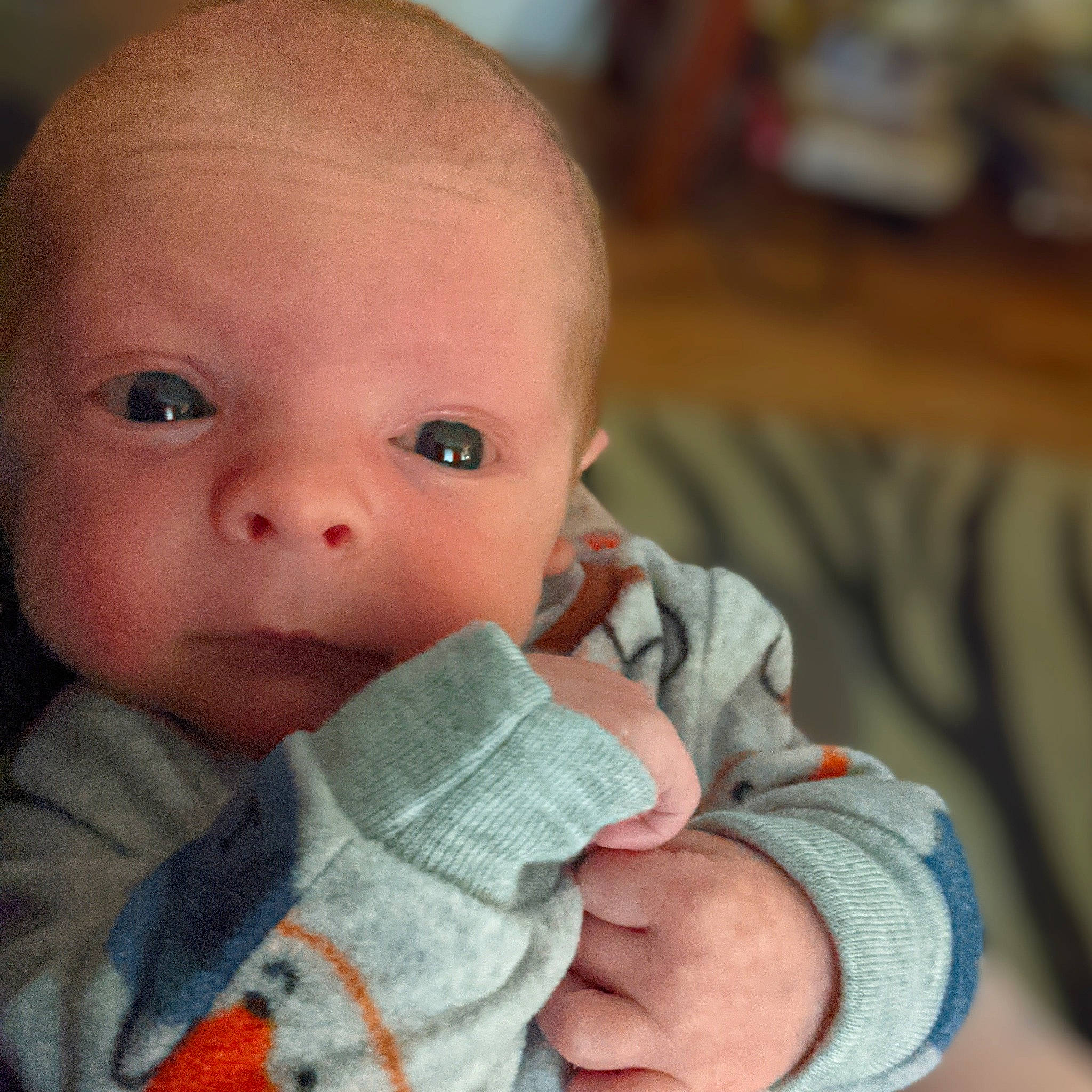 Vash is registered to the contest to win money with this photo: baby, baby_toddler_clothing, cheek, child, comfort, ear, eye, eyebrow, eyelash, finger, gesture, iris, linens, lip, nail, nose, person, skin, sleeve, thumb