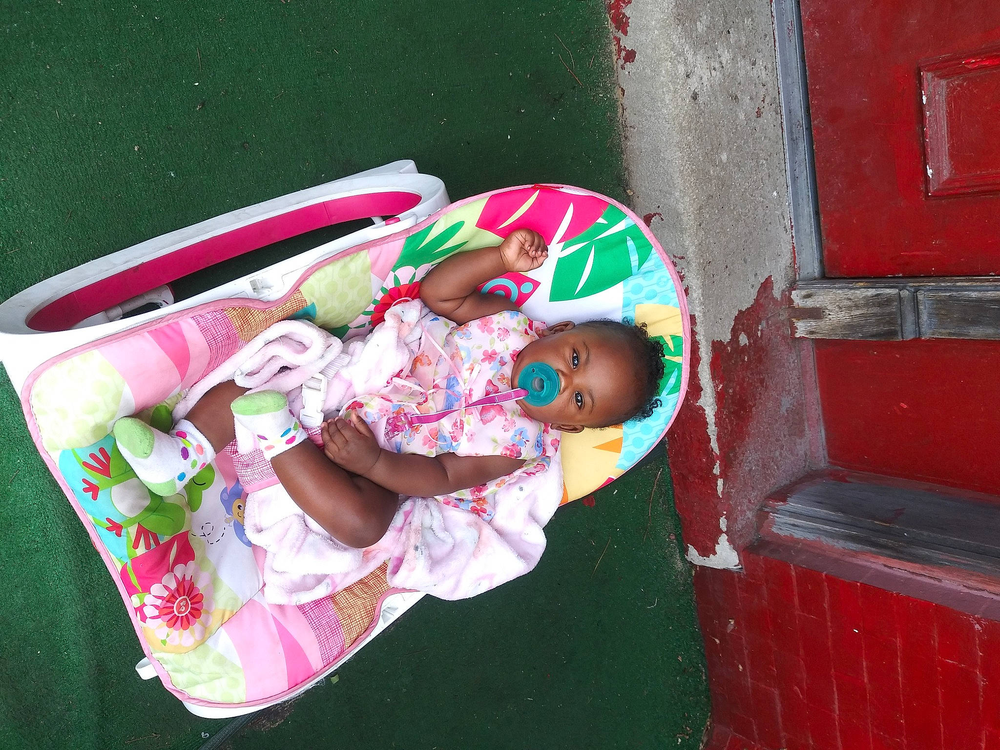 Ne'Zyiah joined the competition — help win amazing prizes! baby, baby_carriage, baby_products, baby_toddler_clothing, child, comfort, fun, grass, happy, hat, leisure, magenta, person, pink, play, product, recreation, sitting, sunglasses, toddler