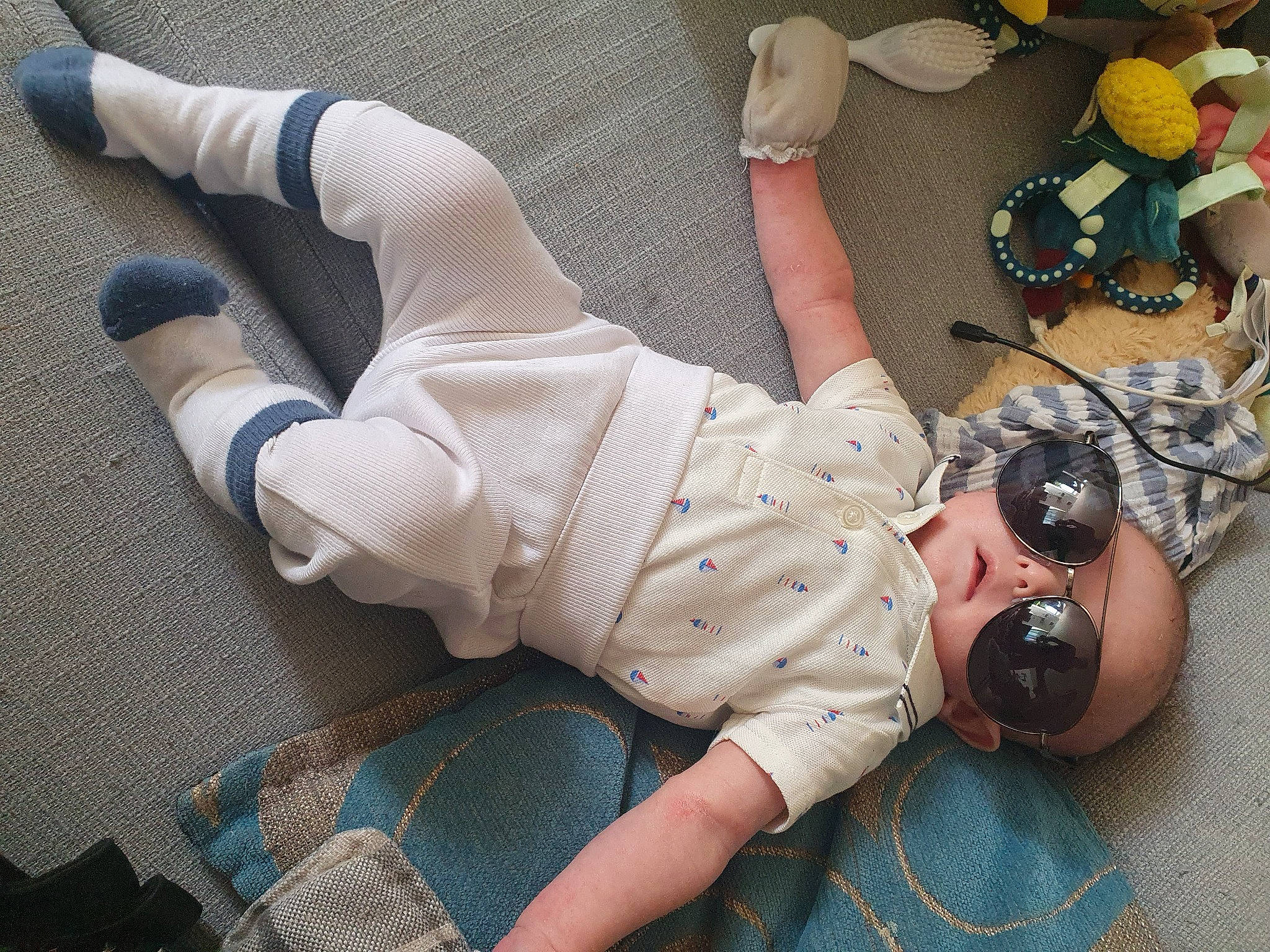 Alfredo joined the competition — help win amazing prizes! abdomen, chest, child, elbow, eyewear, foot, fun, goggles, human_leg, joint, knee, leg, pattern, person, personal_protective_equipment, sitting, sock, sportswear, sunglasses, thigh