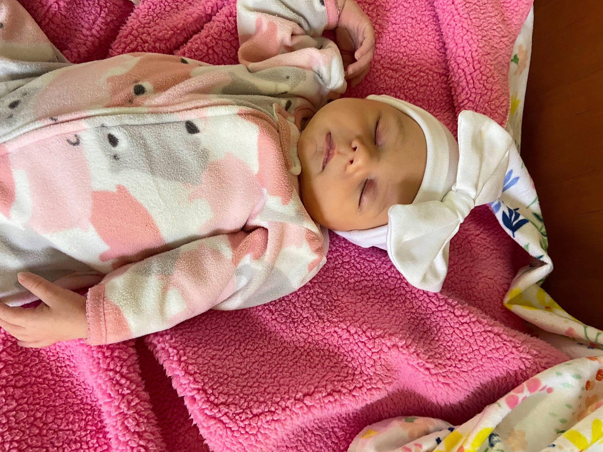 Charlotte is registered to the contest to win money with this photo: baby, baby_carriage, baby_products, baby_sleeping, baby_toddler_clothing, bedtime, cheek, child, comfort, eyelash, headwear, linens, nap, pattern, person, pink, room, skin, sleep, textile