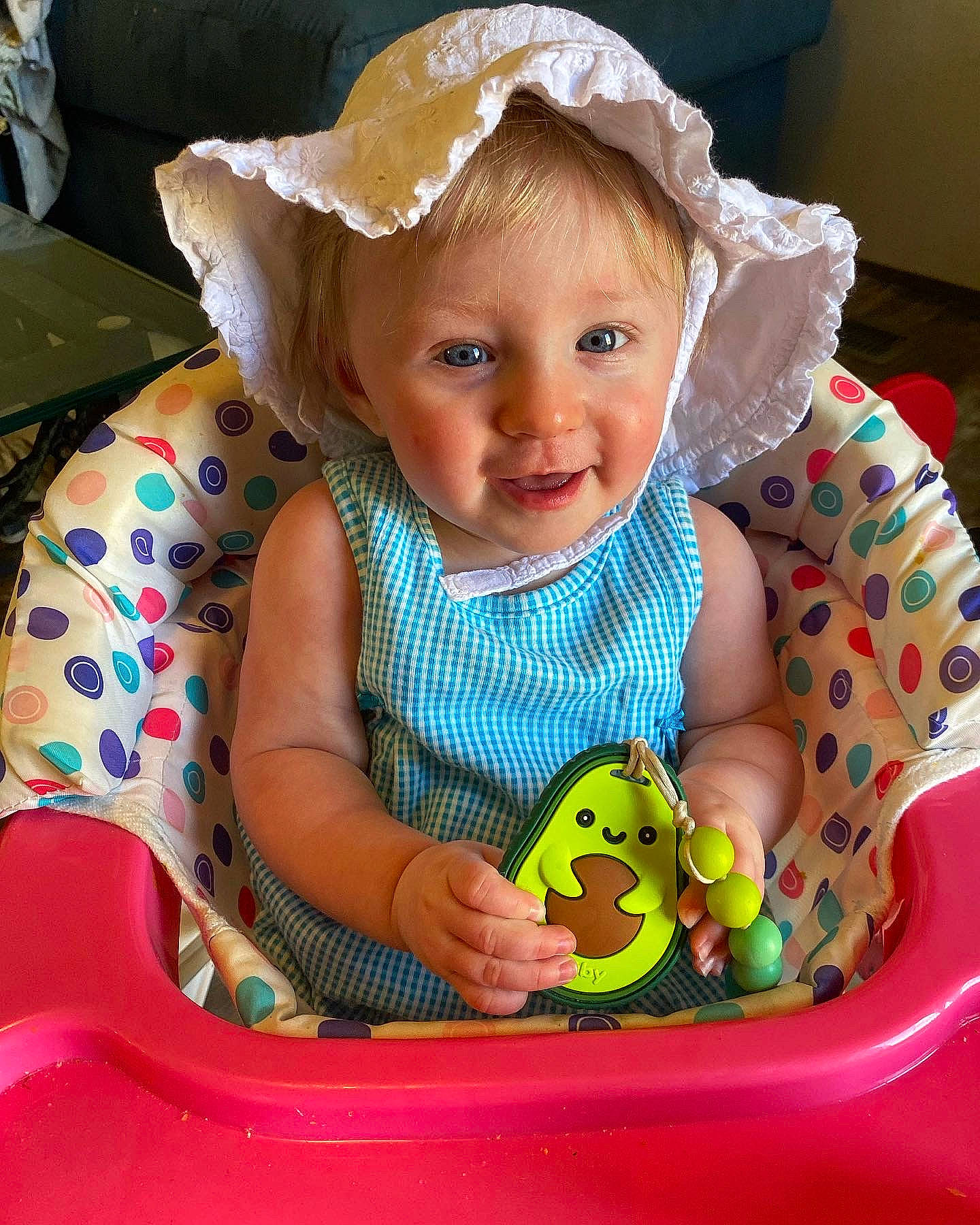 Cecelia is registered to the contest to win money with this photo: baby, baby_playing_with_toys, baby_products, baby_toddler_clothing, cheek, child, eye, fashion_accessory, fun, happy, head, iris, organ, person, pink, product, sitting, skin, sleeve, smile