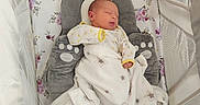 Ella Grace joined the competition — help win amazing prizes! baby, bassinet, blanket, child, cozy, cute, fabric, floral_pattern, indoors, infant, mesh_sides, newborn, nursery, peaceful, pillow, resting, sleeping, small, soft_toy, wrapped