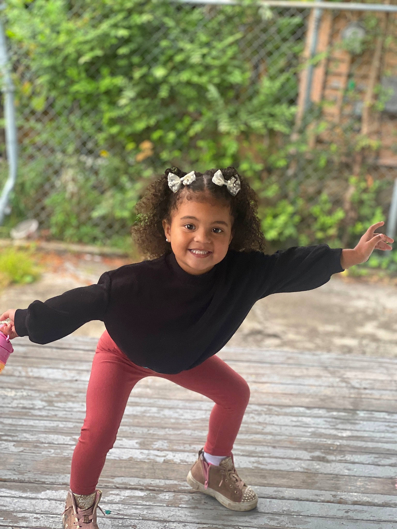 Maleah is registered to the contest to win money with this photo: active_pants, exercise, flash_photography, footwear, fun, grass, happy, joy, knee, leisure, people_in_nature, person, plant, recreation, shoe, sneakers, sportswear, sunglasses, t_shirt, thigh