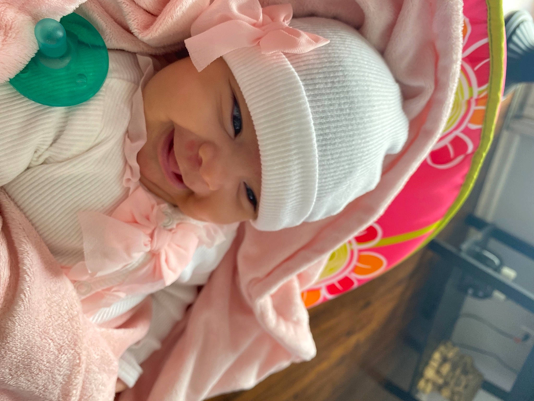 Esmeralda is registered to the contest to win money with this photo: baby, baby_products, baby_safety, baby_toddler_clothing, cheek, child, comfort, finger, hat, headwear, linens, lip, mouth, nail, person, pink, room, skin, sleeve, smile