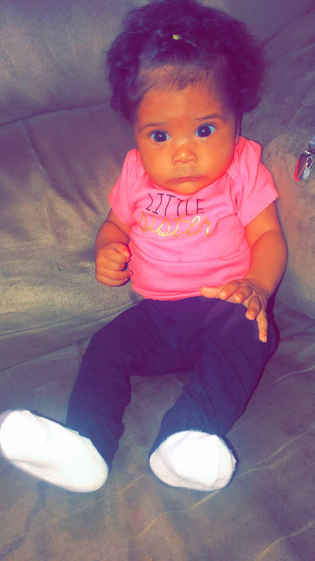 Jaida is registered to the contest to win money with this photo: baby, cheek, child, eye, face, fun, head, nose, person, pink, play, skin, smile, toddler