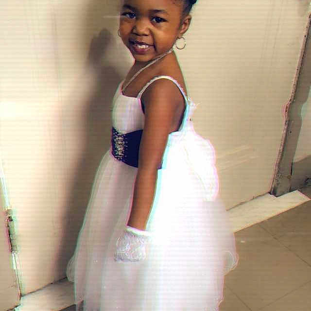 Syleena is registered to the contest to win money with this photo: bridal_party_dress, child, child_model, clothing, costume, dress, flower_girl, formal_wear, gown, hair, hair_accessory, hairstyle, headband, headpiece, joy, person, pink, shoulder, skin, smile