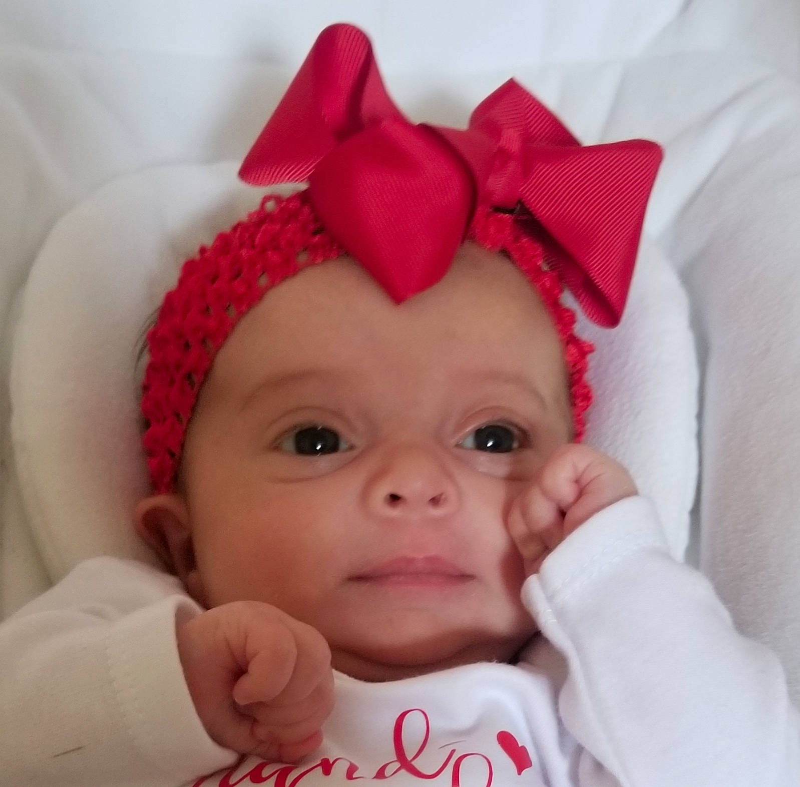 Jemma joined the competition — help win amazing prizes! baby, baby_toddler_clothing, cap, cheek, chin, comfort, costume_hat, eyebrow, face, gesture, happy, head, headwear, lip, nose, person, pink, skin, sleeve, smile