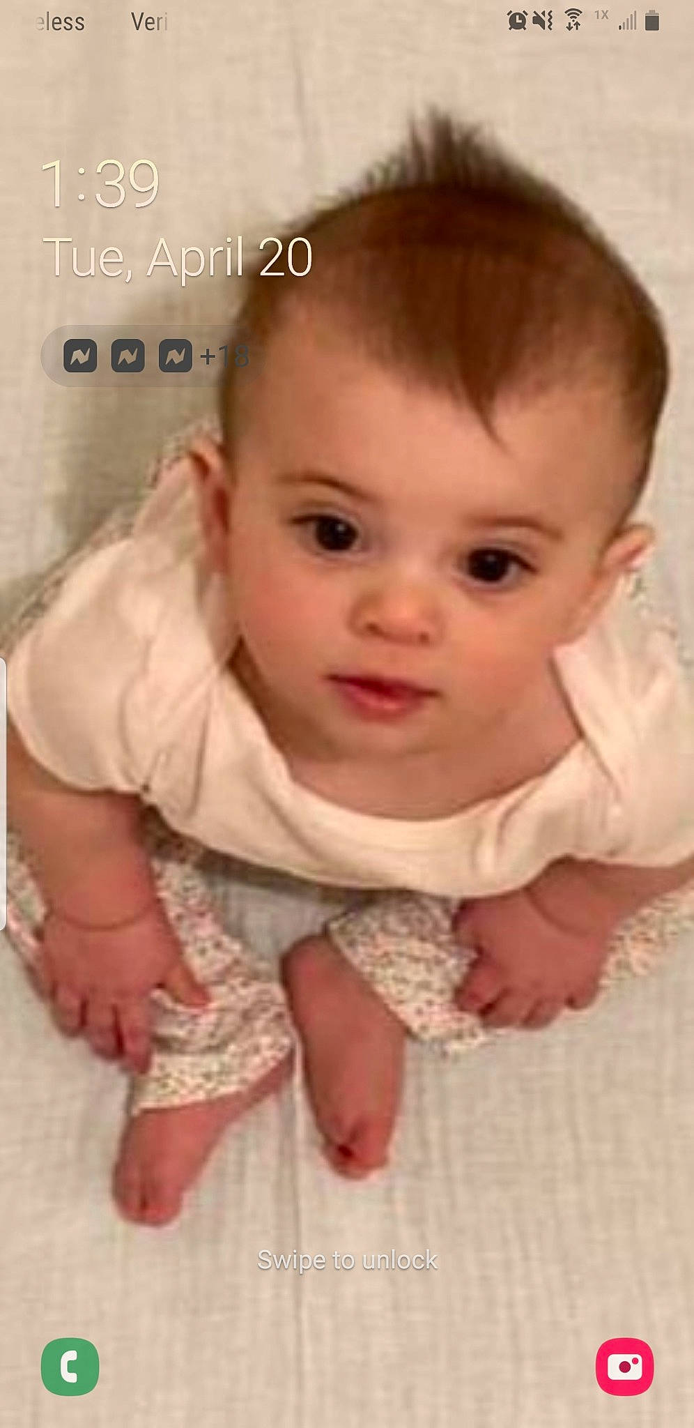 Jemma is registered to the contest to win money with this photo: baby, baby_toddler_clothing, cheek, child, collar, dress, eyelash, finger, flooring, gesture, happy, lip, neck, nose, pattern, person, pink, skin, sleeve, thumb