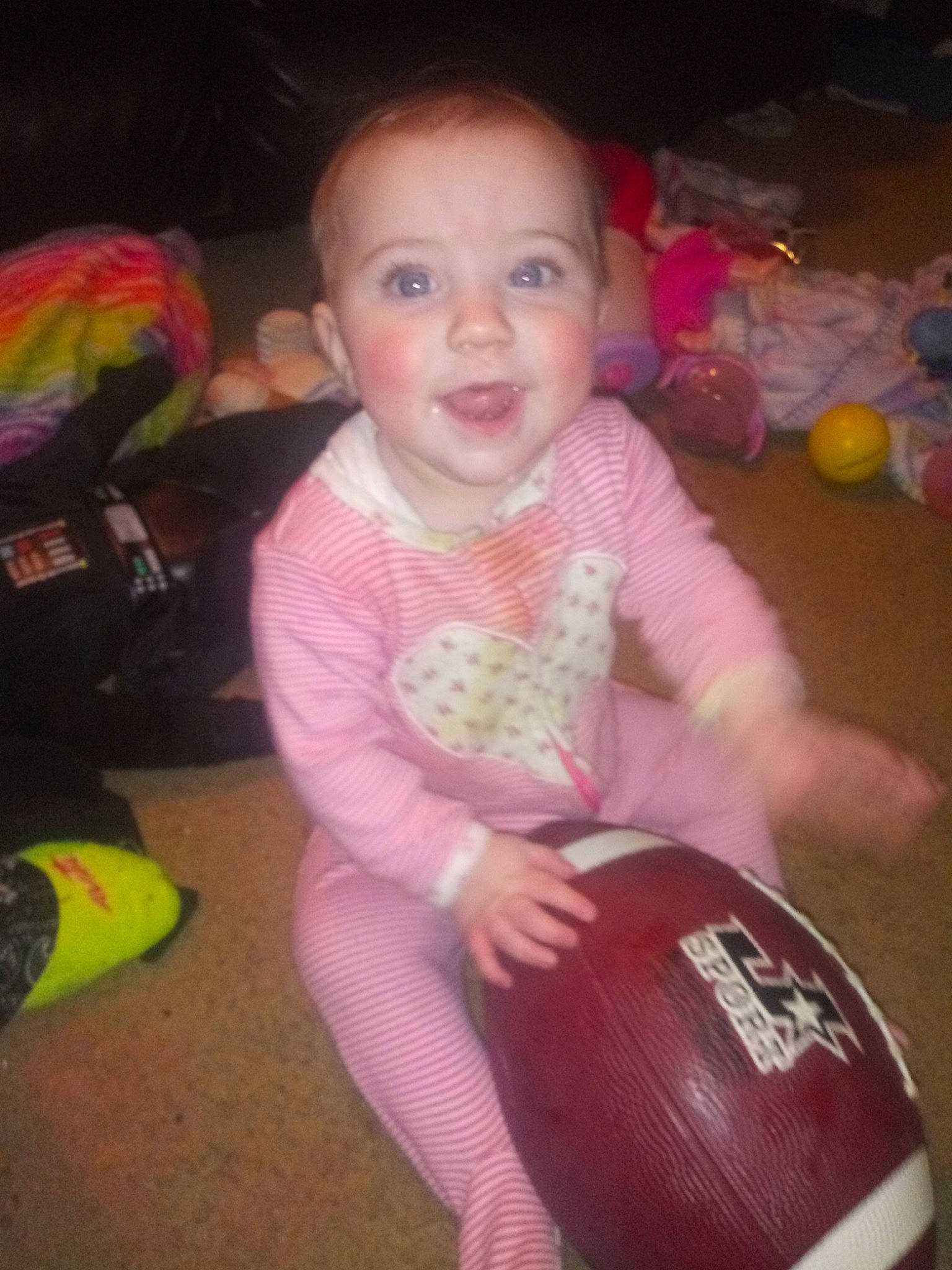 Chloe is registered to the contest to win money with this photo: baby, ball, cheek, child, face, fun, iris, person, pink, play, sitting, skin, smile, toddler