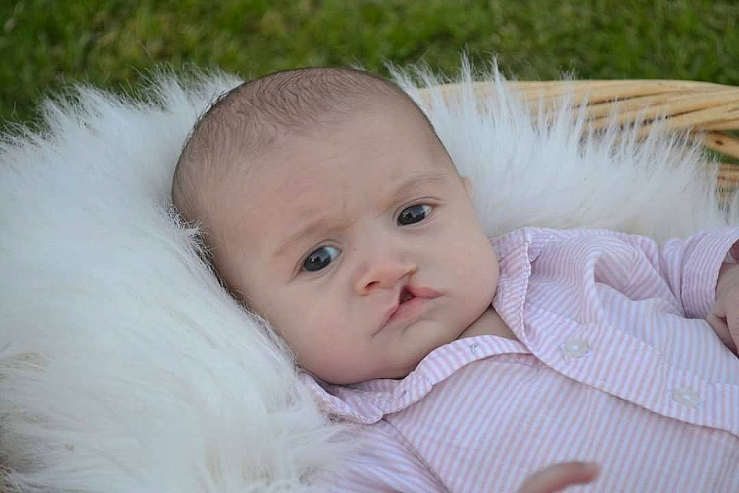 Brenton is registered to the contest to win money with this photo: baby, cheek, child, close_up, eye, face, fur, head, iris, lip, nose, person, photography, portrait_photography, skin, toddler