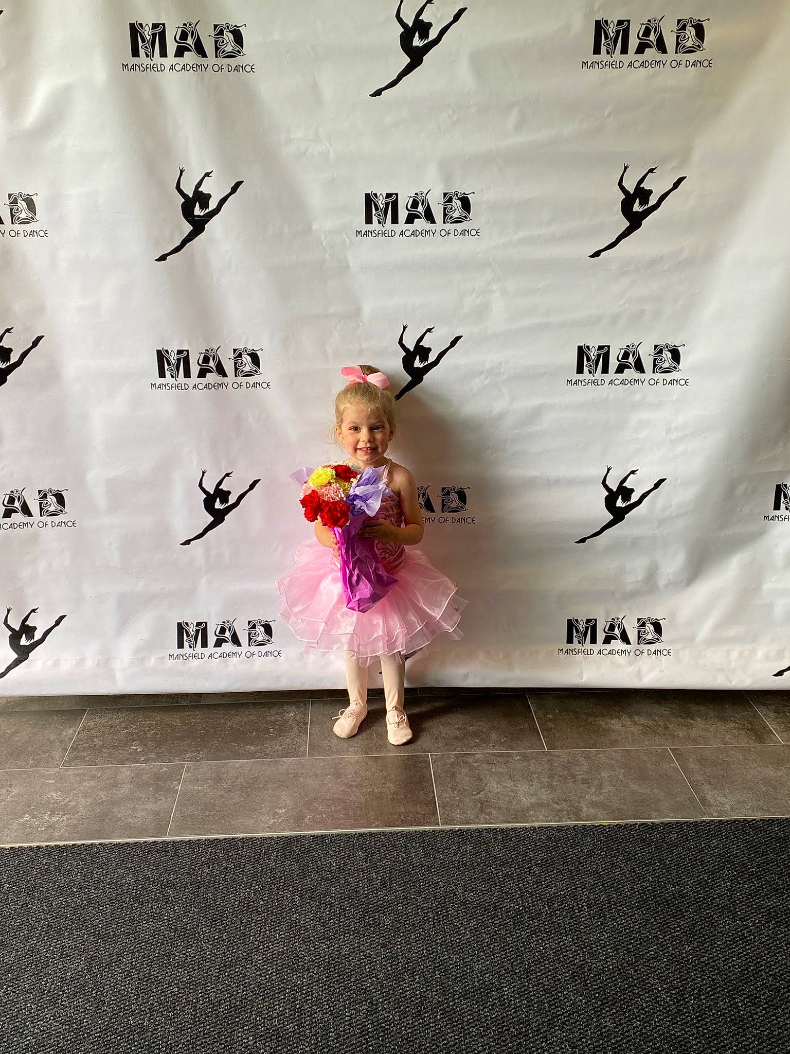 Talia joined the competition — help win amazing prizes! advertising, child, dress, event, fashion_design, flooring, font, happy, joy, magenta, pattern, person, recreation, road, sandal, sky, toddler, wall