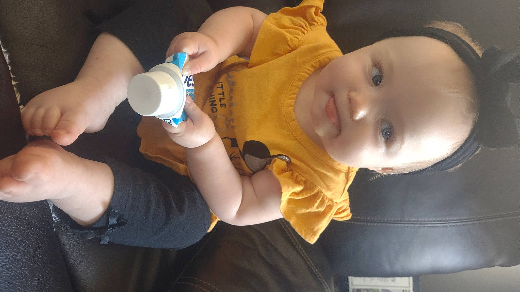 Josephine joined the competition — help win amazing prizes! arm, baby, baby_toddler_clothing, child, drinkware, ear, elbow, finger, flash_photography, gesture, hand, happy, human_body, nail, person, plastic_bottle, skin, smile, thumb, toddler