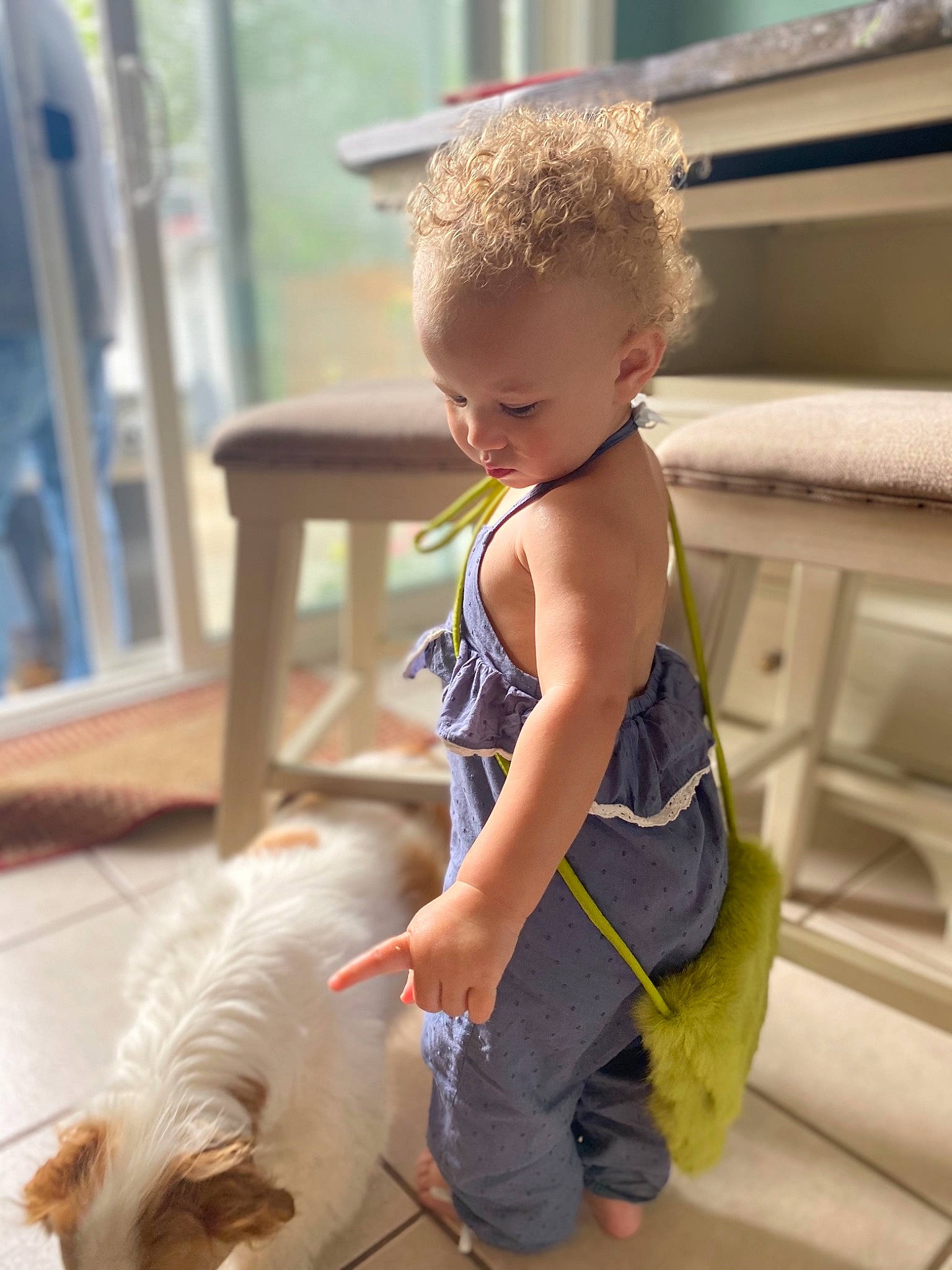 Kamila is registered to the contest to win money with this photo: baby_toddler_clothing, child, companion_dog, dog, elbow, floor, flooring, foot, fun, happy, hardwood, human_leg, joint, knee, leisure, mammal, person, sitting, thigh, toddler