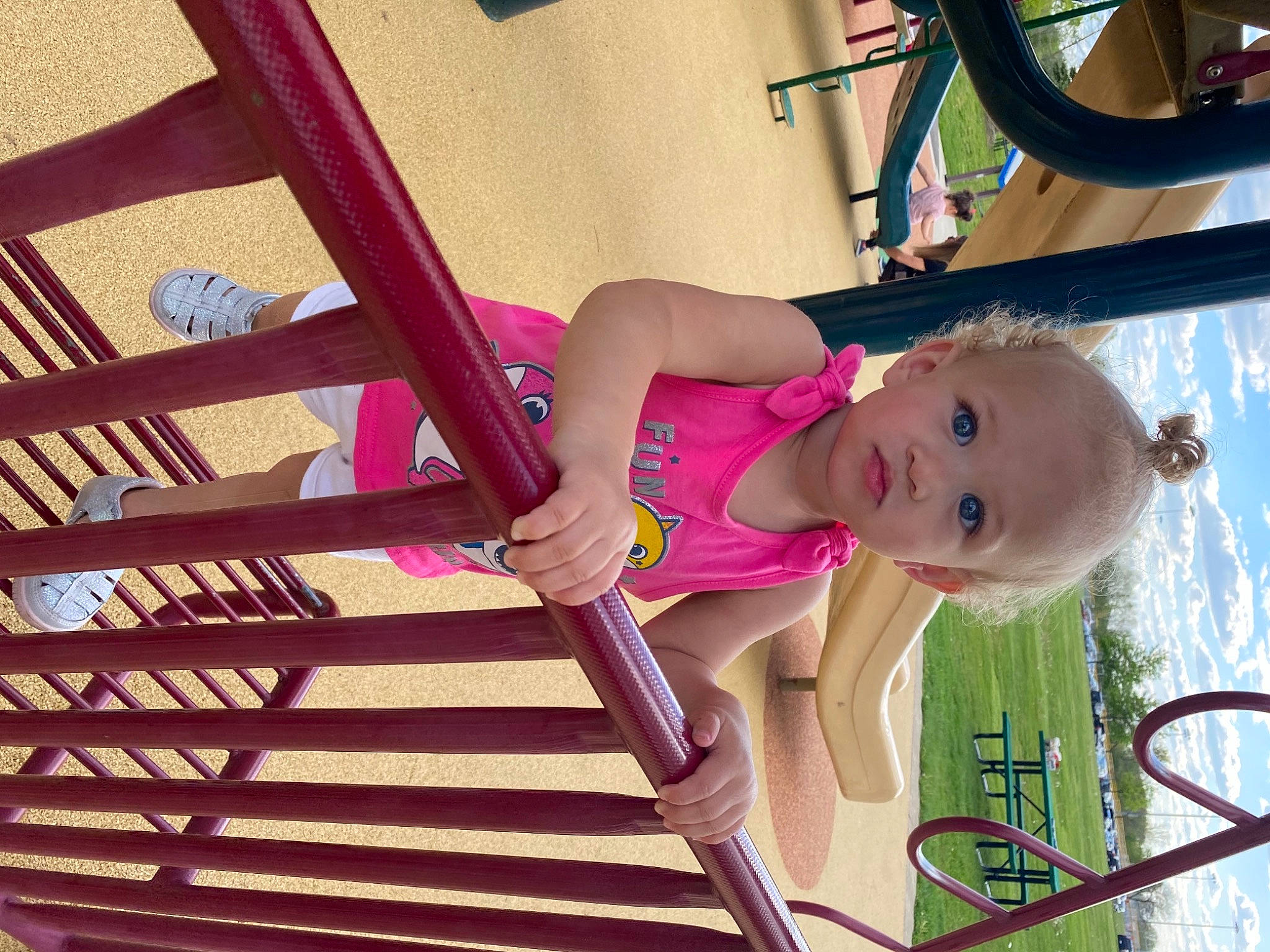 Kamila is registered to the contest to win money with this photo: amusement_park, baby_toddler_clothing, child, city, door, fun, happy, leisure, magenta, metal, outdoor_play_equipment, person, pink, play, playground, recreation, smile, thigh, tire, toddler