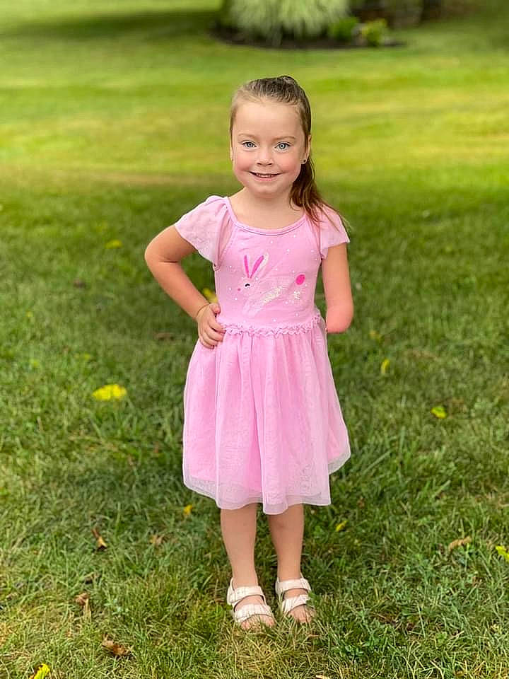 Aleesyia is registered to the contest to win money with this photo: baby_toddler_clothing, child, day_dress, dress, formal_wear, grass, grass_family, grassland, hair, hand, happy, joy, magenta, meadow, one_piece_garment, people_in_nature, person, pink, plant, smile