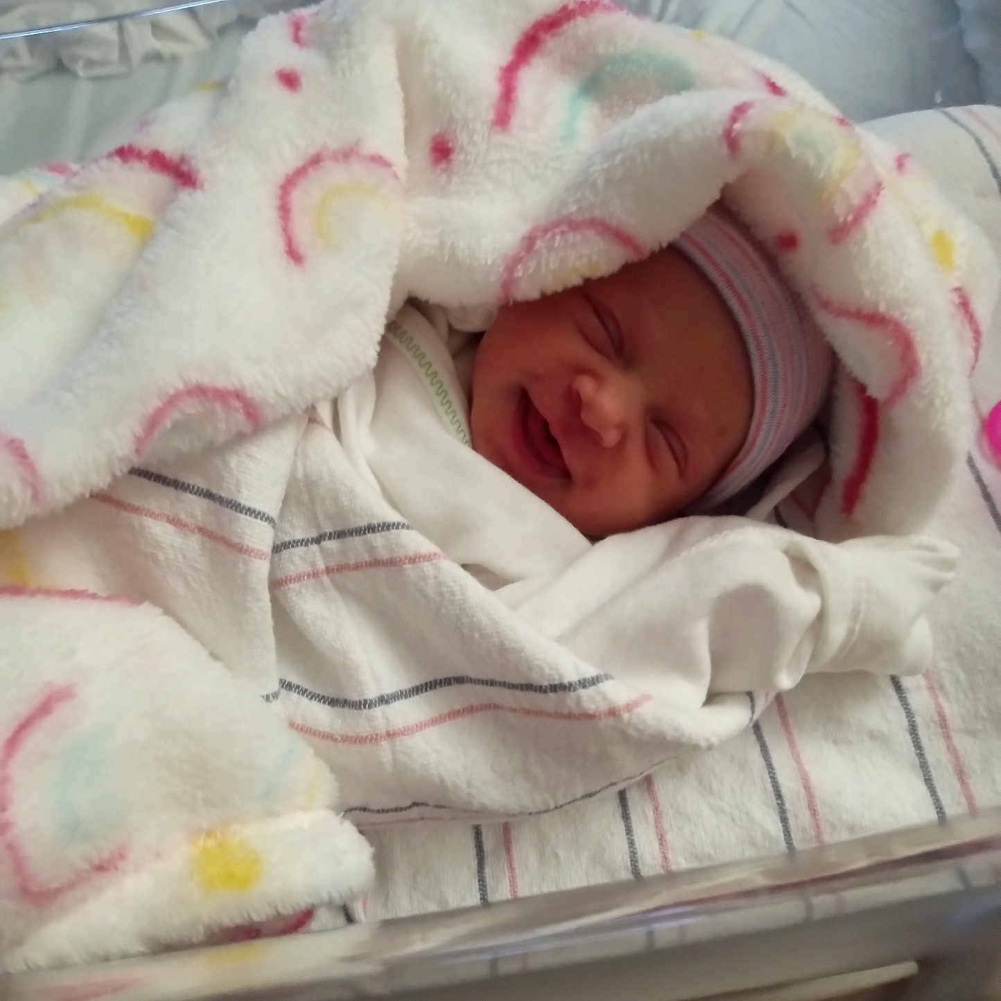 Lena joined the competition — help win amazing prizes! baby, bassinet, bed, blanket, clothing, cozy, cute, hat, hospital, infant, lying, newborn, nursery, person, sleeping, smile, soft, toddler, warm, wrapped