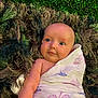 Nayeli joined the competition — help win amazing prizes! baby, infant, newborn, swaddle, butterfly_pattern, blanket, shag_rug, green_backdrop, foliage, portrait, face, eyes, gaze, cute, lying_down, arm, soft_texture, cozy, expression, skin