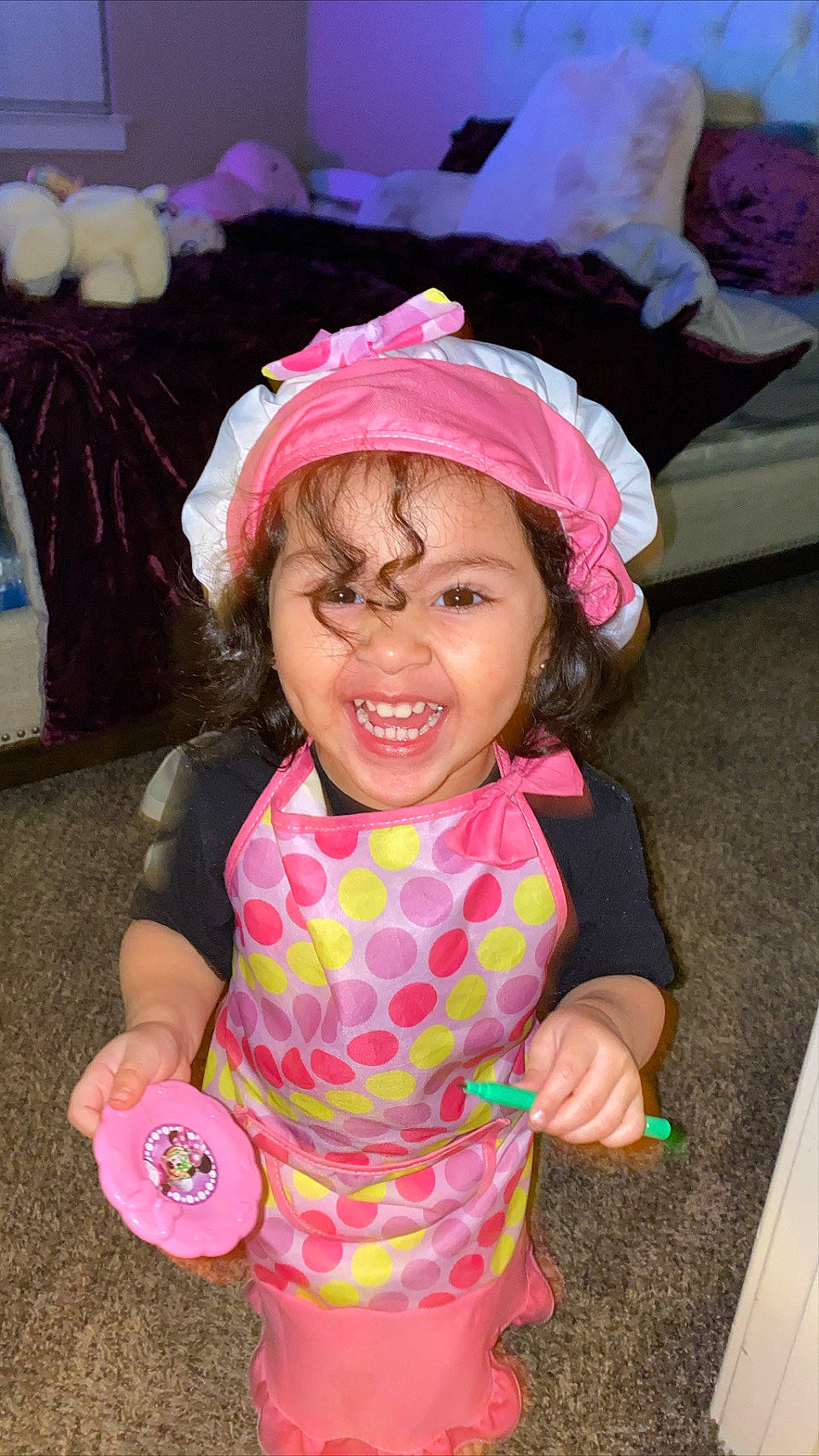 Alina is registered to the contest to win money with this photo: baby_toddler_clothing, cap, child, event, eyewear, fashion_accessory, fun, gesture, happy, joy, laugh, leisure, lip, magenta, party_supply, person, pink, purple, smile, thumb