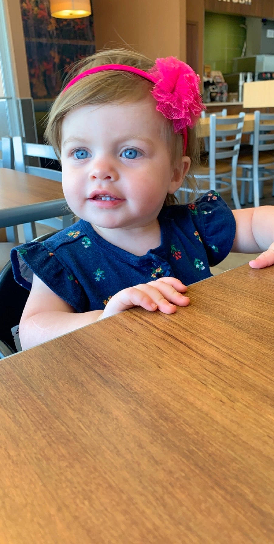 Teagan is registered to the contest to win money with this photo: baby, blond, cheek, child, face, fashion_accessory, floor, flooring, hair, hair_accessory, hardwood, head, headband, headgear, person, play, skin, smile, toddler, wood