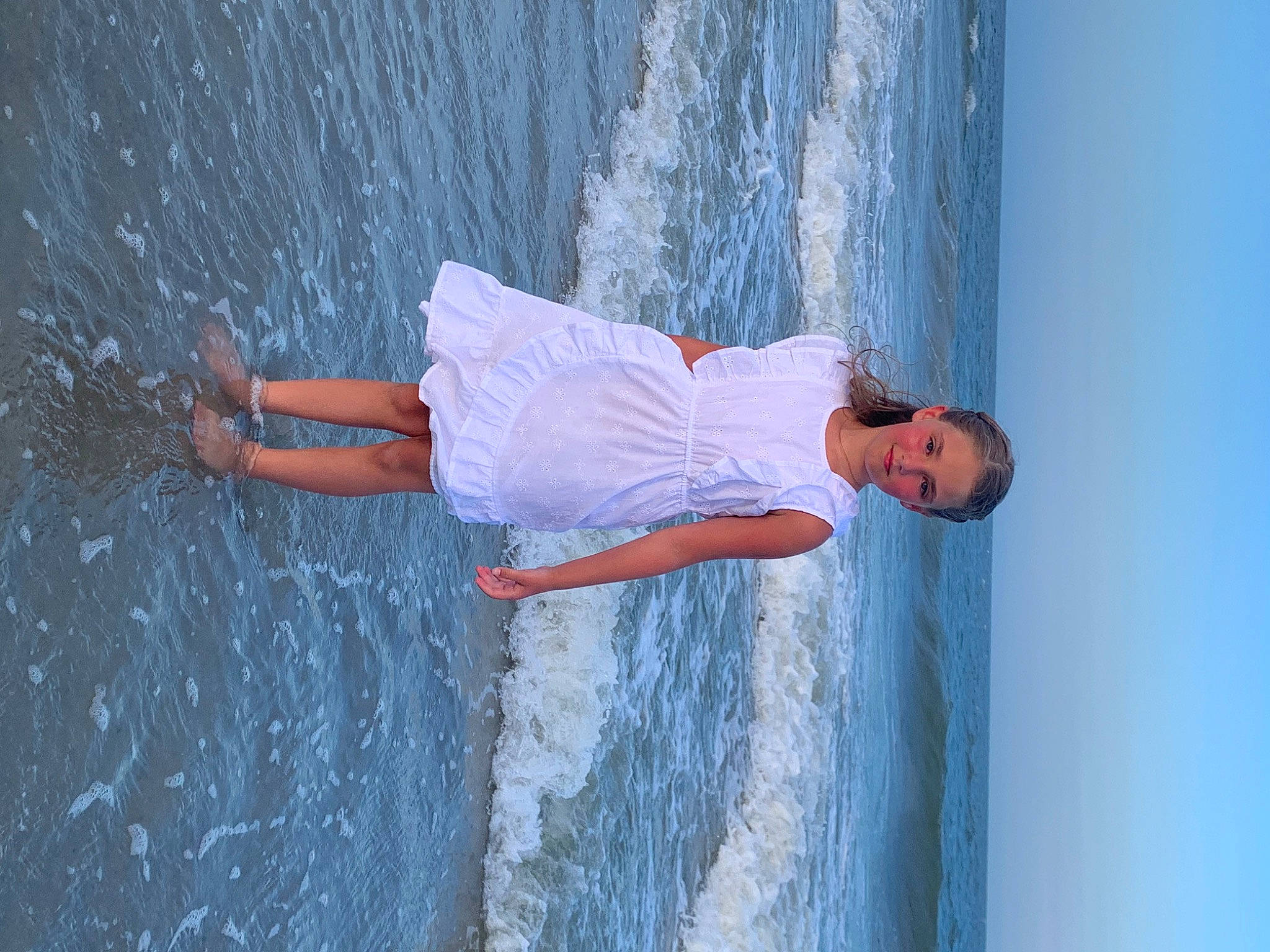 Chloie is registered to the contest to win money with this photo: azure, beach, blue, boat, elbow, electric_blue, flash_photography, fun, hand, happy, human_body, lake, leisure, person, recreation, ship, sky, tree, water, wind_wave