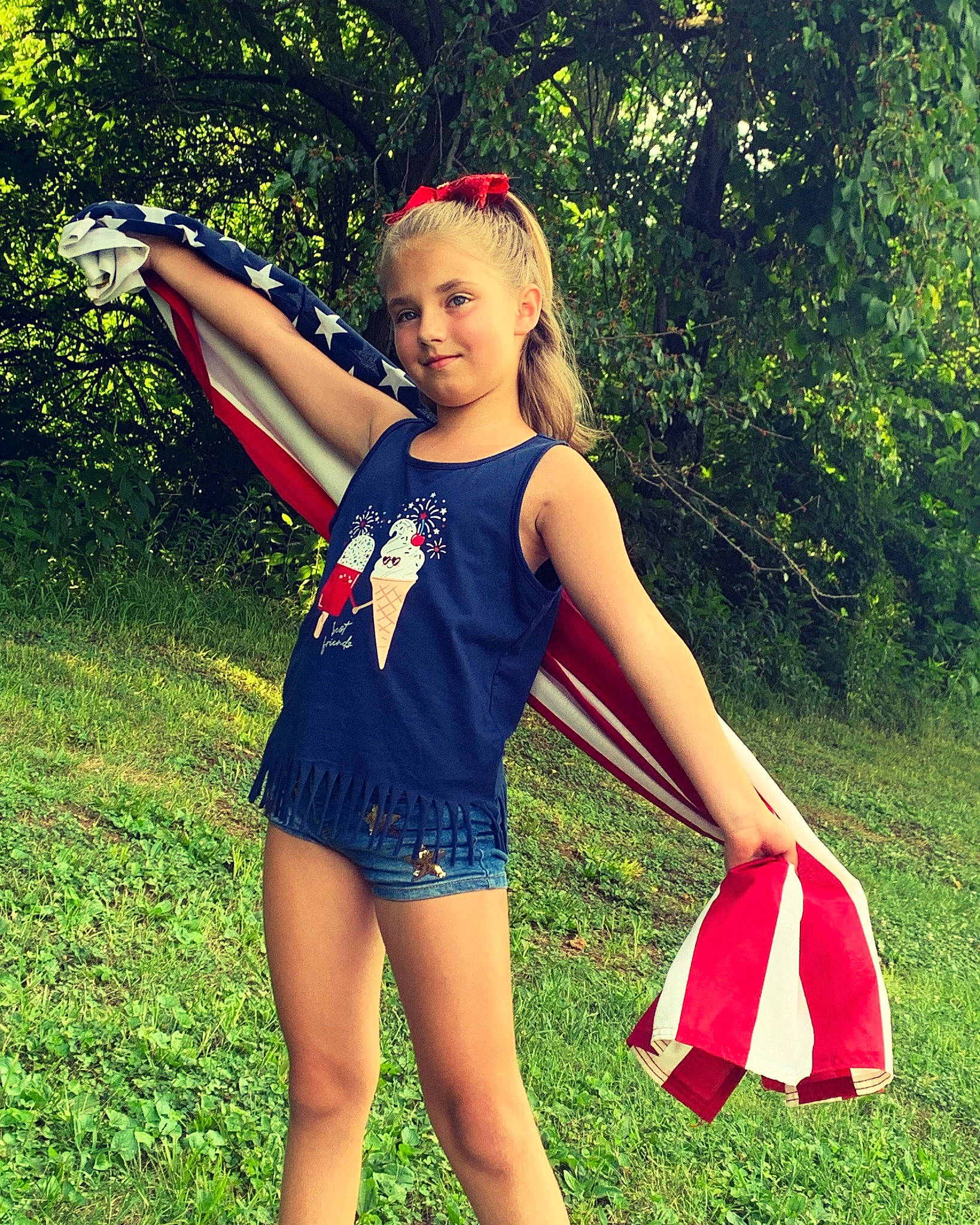 Chloie joined the competition — help win amazing prizes! electric_blue, fun, grass, happy, human_leg, joy, leisure, meadow, nature, people_in_nature, person, plant, recreation, smile, summer, sunlight, t_shirt, thigh, tree, trunk