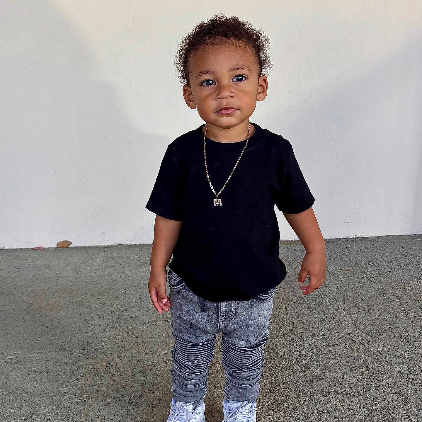 Masai is registered to the contest to win money with this photo: accessories, boy, child, clothing, face, hair, head, jeans, jewelry, longsleeve, male, necklace, pants, pendant, person, photography, portrait, sitting, sleeve, standing