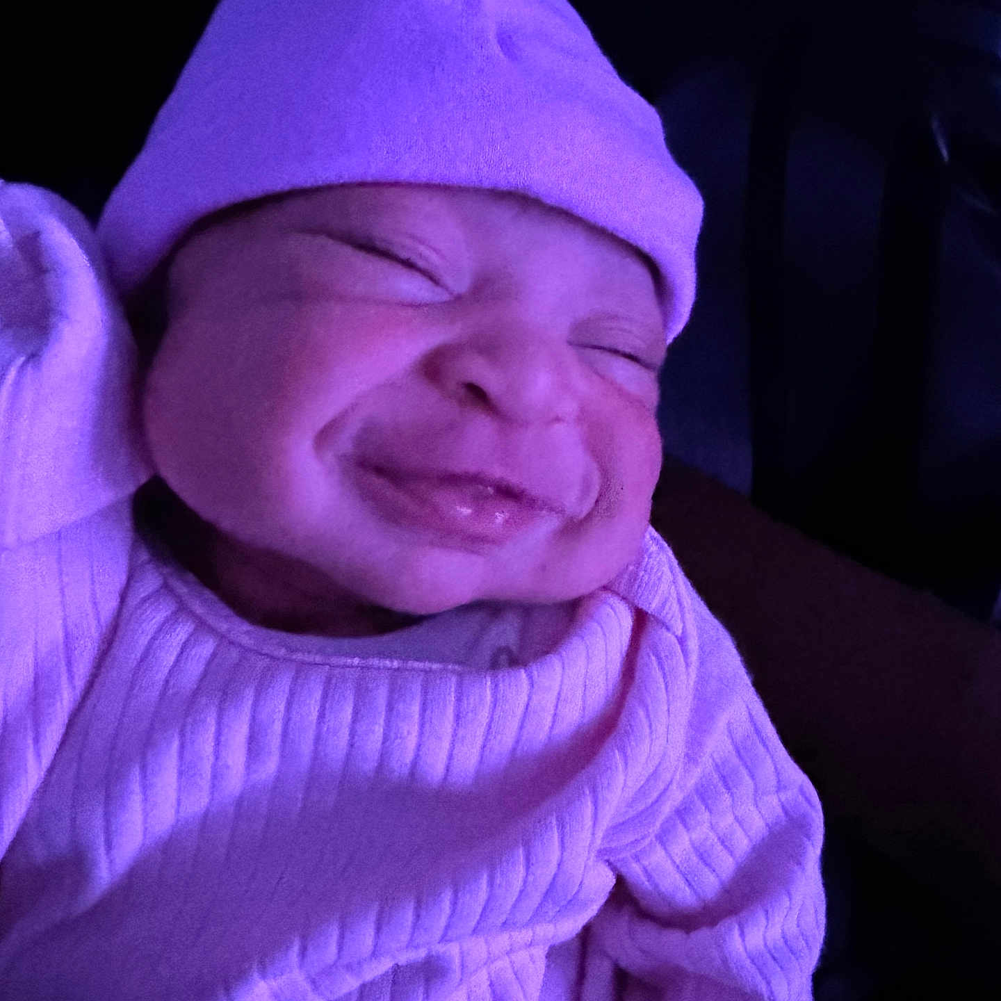 Alani joined the competition — help win amazing prizes! baby, beanie, bonnet, cap, clothing, face, happy, hat, head, hood, hoodie, knitwear, newborn, person, photography, portrait, purple, smile, sweater, sweatshirt