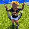 child, toddler, swing, playground, grass, artificial_grass, headband, yellow, black_tshirt, rainbow, shoes, happy, smiling, outdoor, play, sunny, daylight, person, young_child, recreation