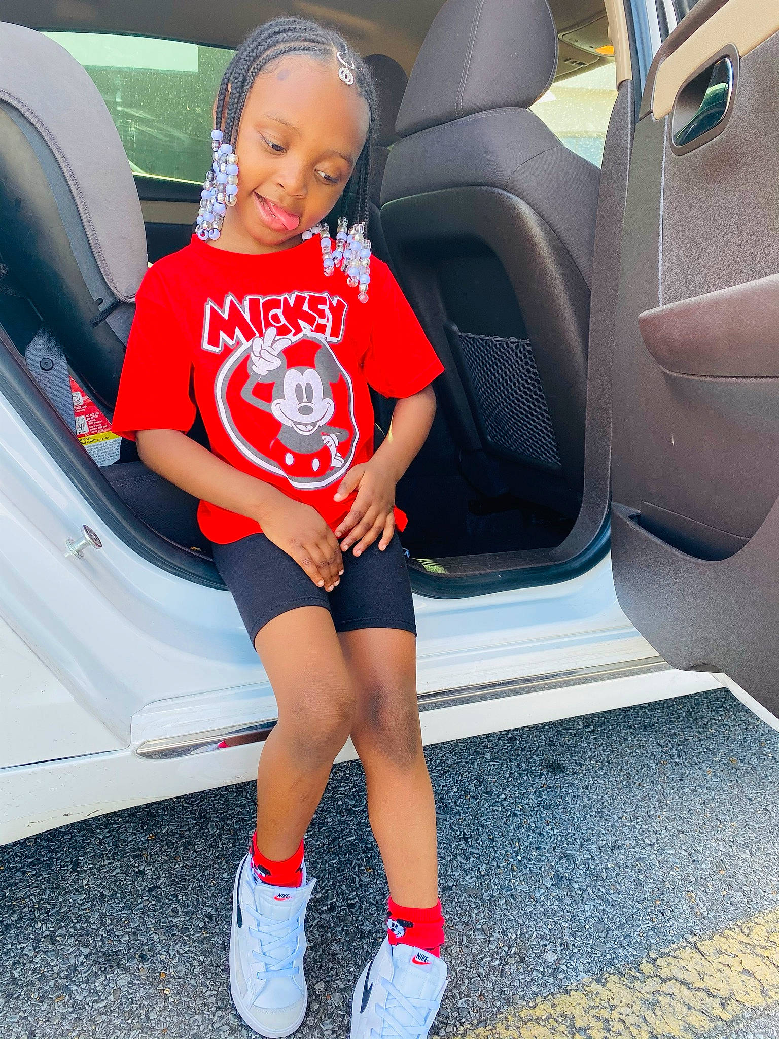 Londyn joined the competition — help win amazing prizes! automotive_design, automotive_exterior, automotive_tire, bumper, car, car_seat, car_seat_cover, dress, hood, joy, knee, leg, motor_vehicle, person, rim, shoe, shorts, sneakers, steering_wheel, thigh