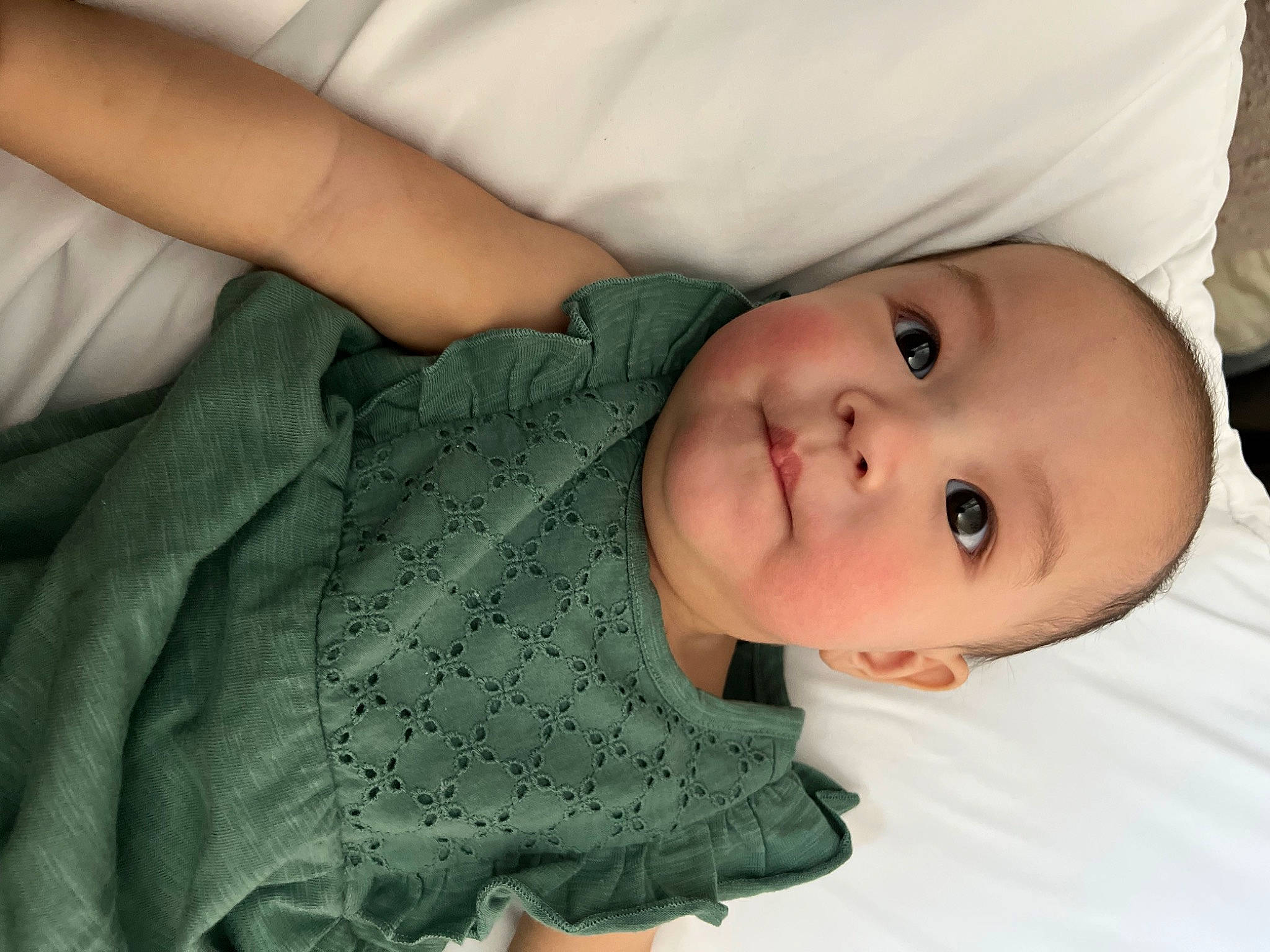 Carly joined the competition — help win amazing prizes! baby, baby_toddler_clothing, cheek, child, comfort, dress, eye, eyelash, head, human_body, iris, linens, lip, nose, pattern, person, skin, sleeve, smile, textile