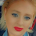 Carolanne R.