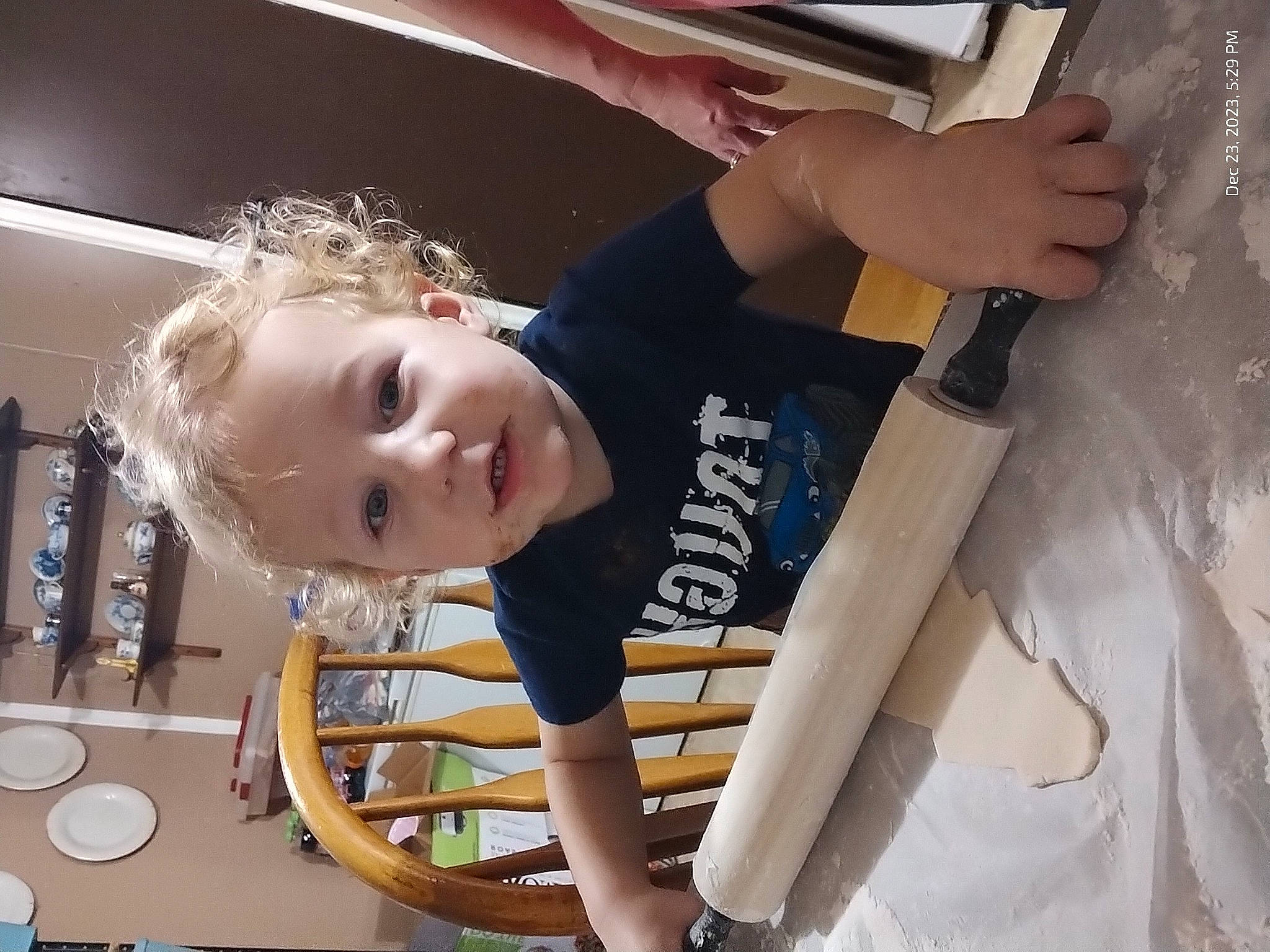 Dezmond is registered to the contest to win money with this photo: automotive_exterior, chest, child, elbow, eyewear, fashion_accessory, flash_photography, fun, gesture, hairstyle, hand, happy, leisure, person, room, shoulder, sleeve, t_shirt, toddler, vehicle_door