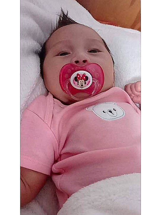 Ohana participe au concours pour gagner de l'argent avec cette photo : baby, baby_products, baby_safety, baby_sleeping, baby_toddler_clothing, bedding, cheek, child, comfort, eyelash, happy, headwear, linens, magenta, mouth, person, pink, skin, sleeve, smile