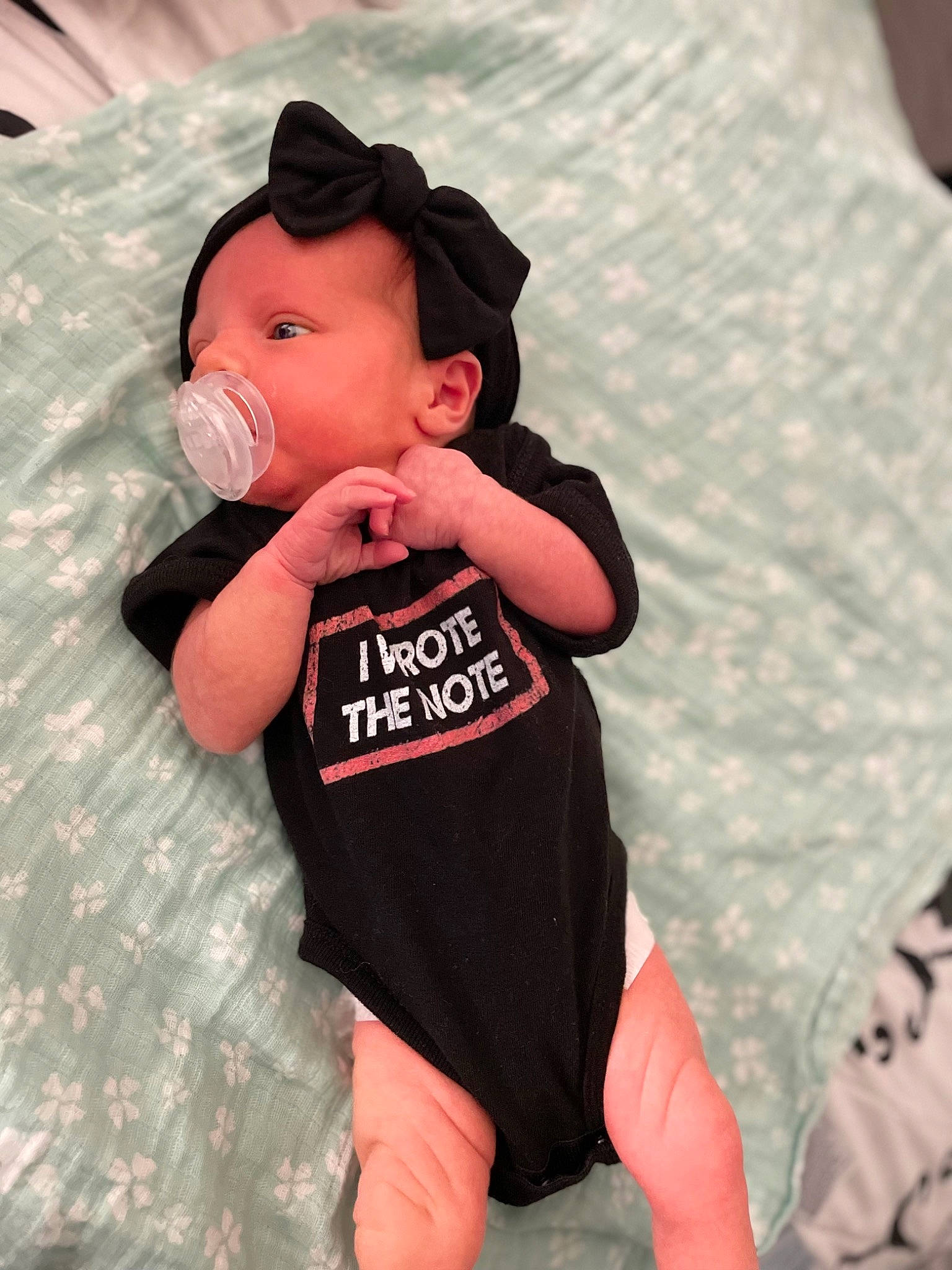 Arielle is registered to the contest to win money with this photo: arm, baby, baby_products, baby_toddler_clothing, cap, child, fashion_accessory, fun, gesture, happy, hat, human_leg, pattern, person, personal_protective_equipment, pink, sleeve, sportswear, t_shirt, thigh