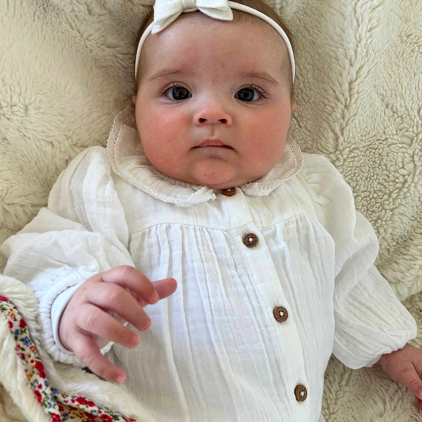 Daisy is registered to the contest to win money with this photo: accessories, baby, bodypart, bonnet, clothing, coat, face, finger, hand, hat, head, homedecor, jacket, knitwear, linen, newborn, person, photography, portrait, sweater