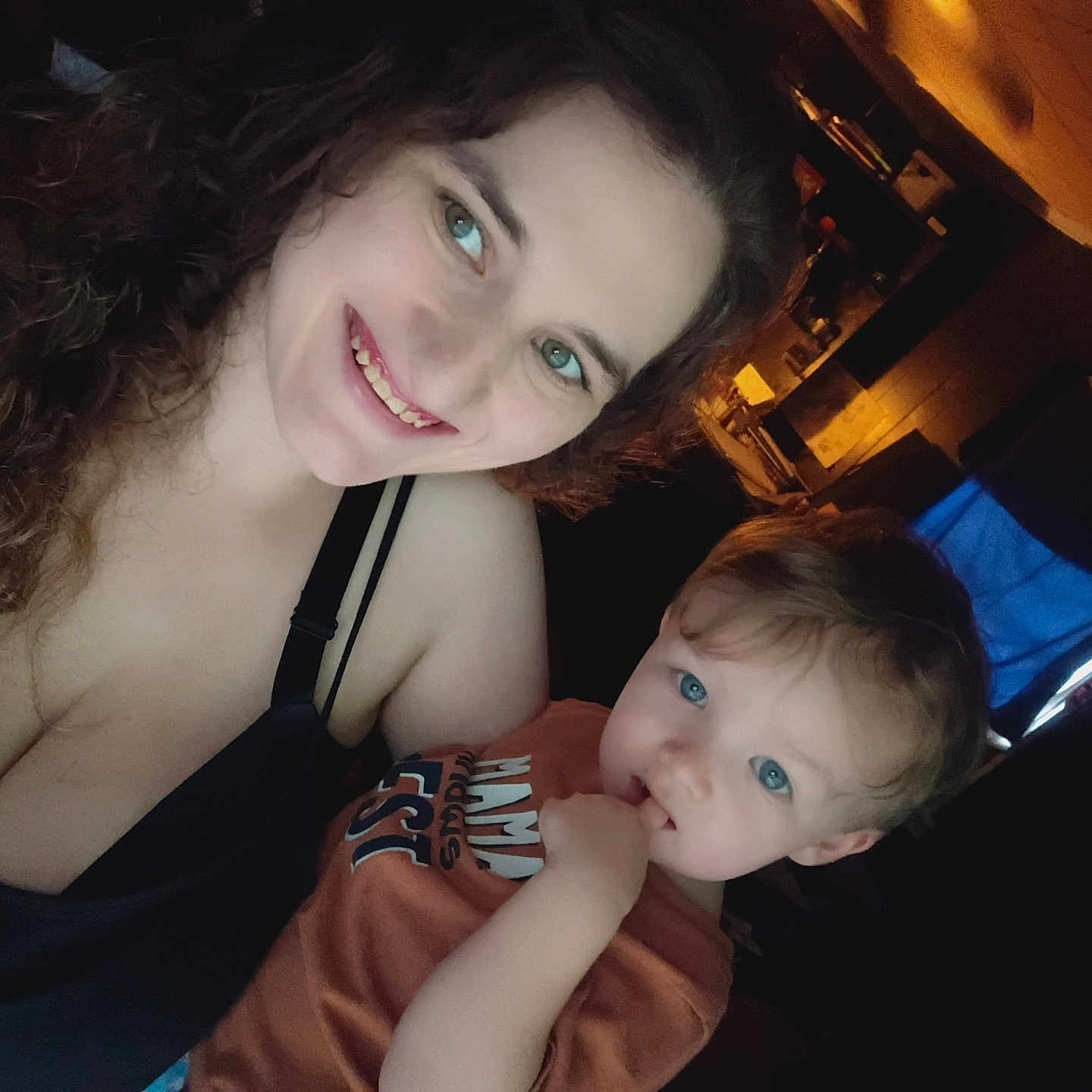 Jameson joined the competition — help win amazing prizes! baby, background, blue_eyes, casual_clothing, child, closeup, curly_hair, family, happy, indoor, light, person, portrait, room, shadow, skin, smile, toddler, woman, young_child